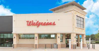 a walgreens store with a blue sky